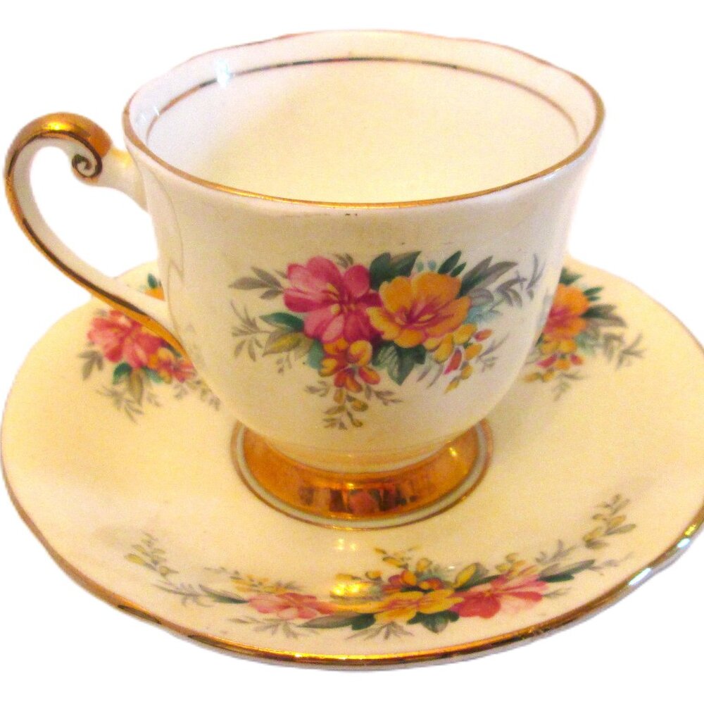 Vtg Windsor butter yellow tea cup and saucer made in England